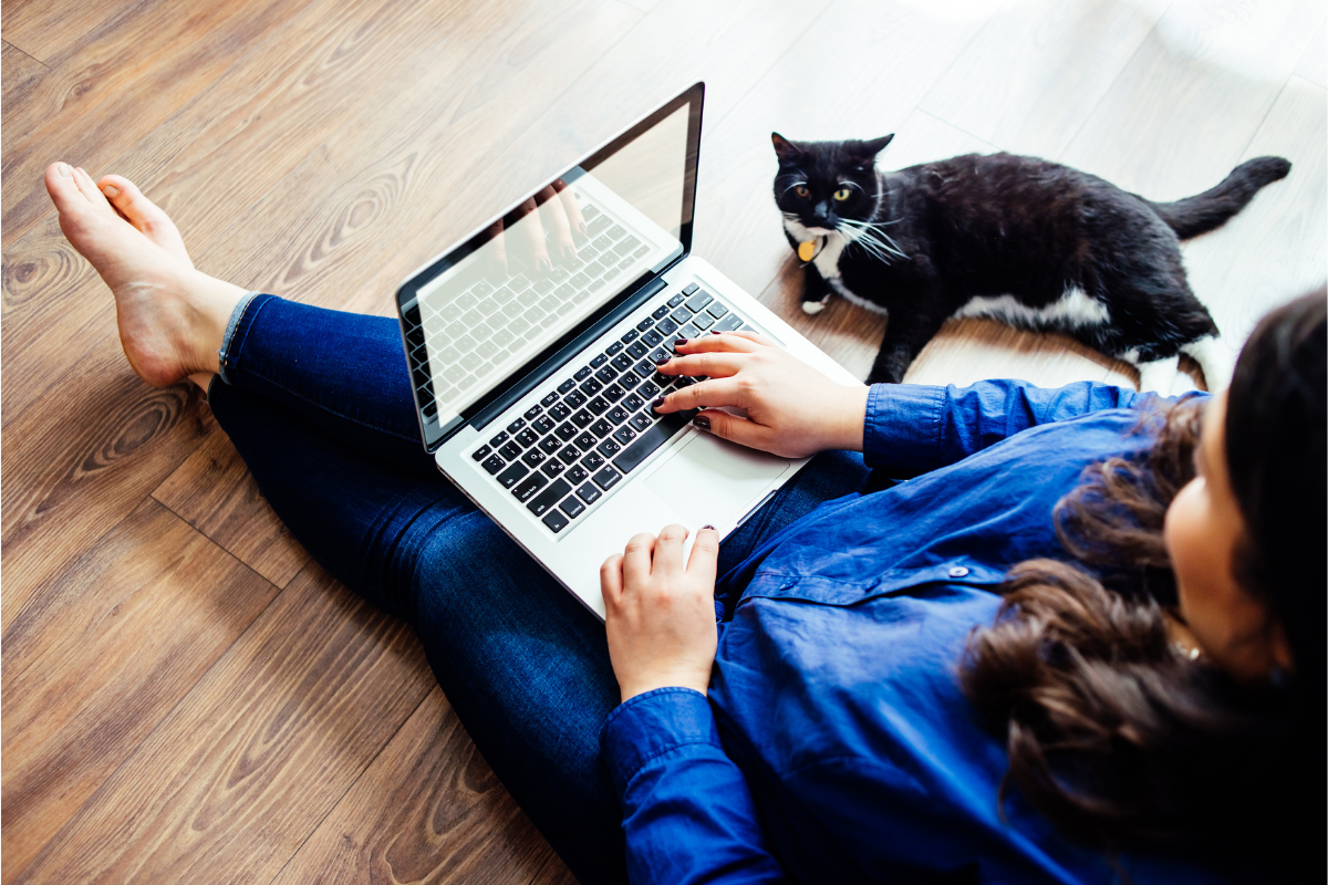 Woman working on a laptop.