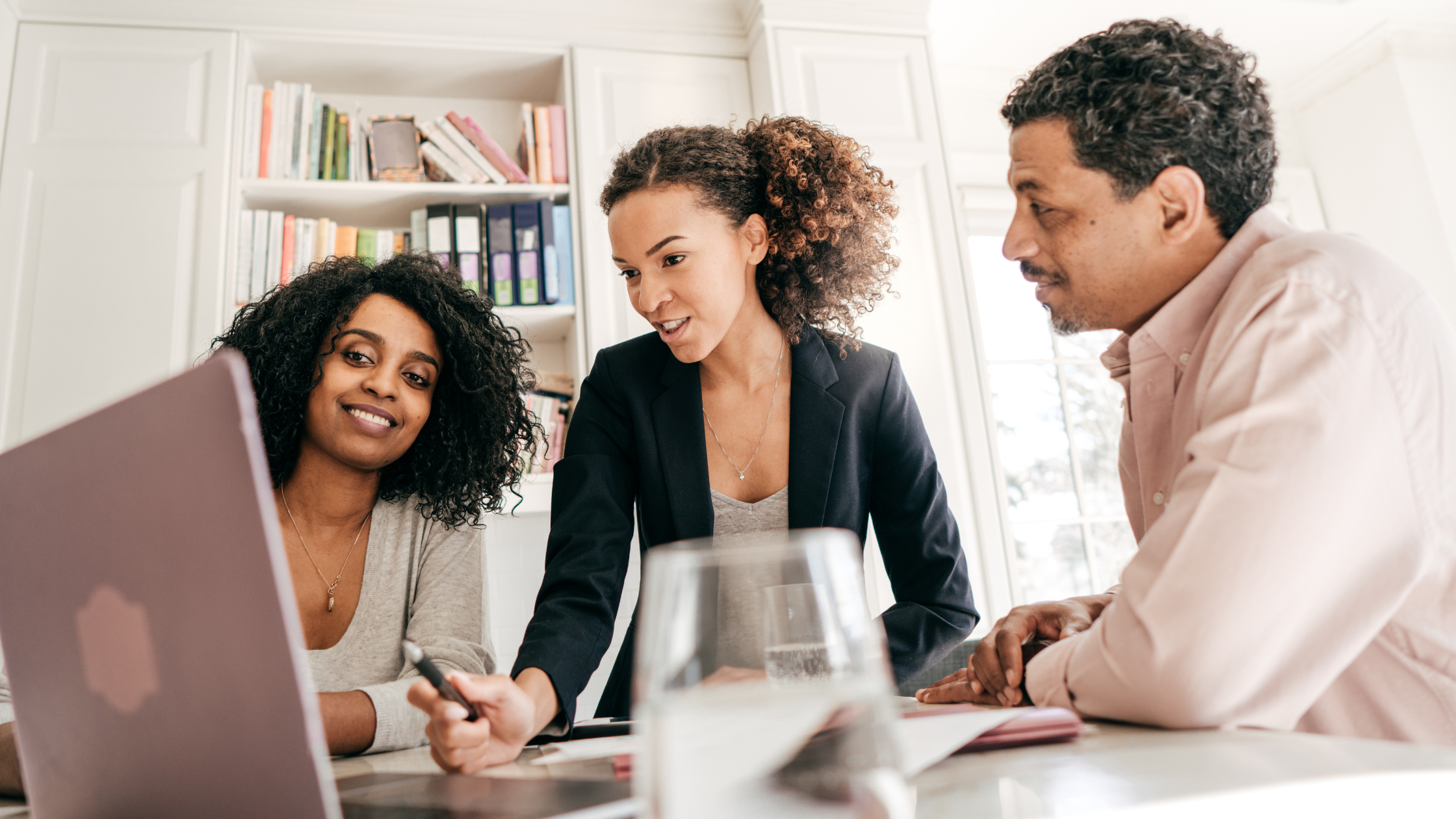 How to Calculate Business Start-up Costs | Three business owners planning