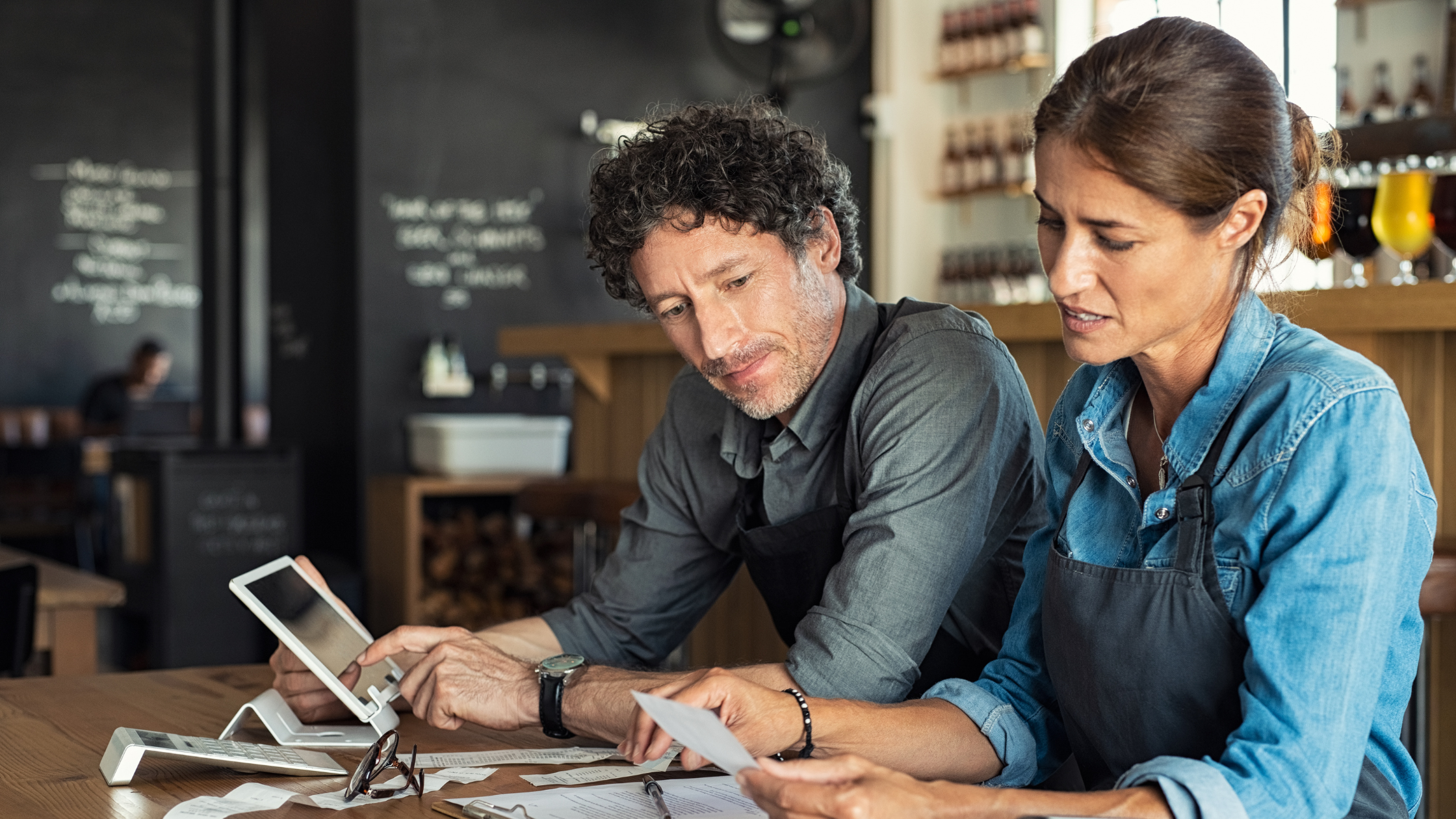 Small business owners working on accounting