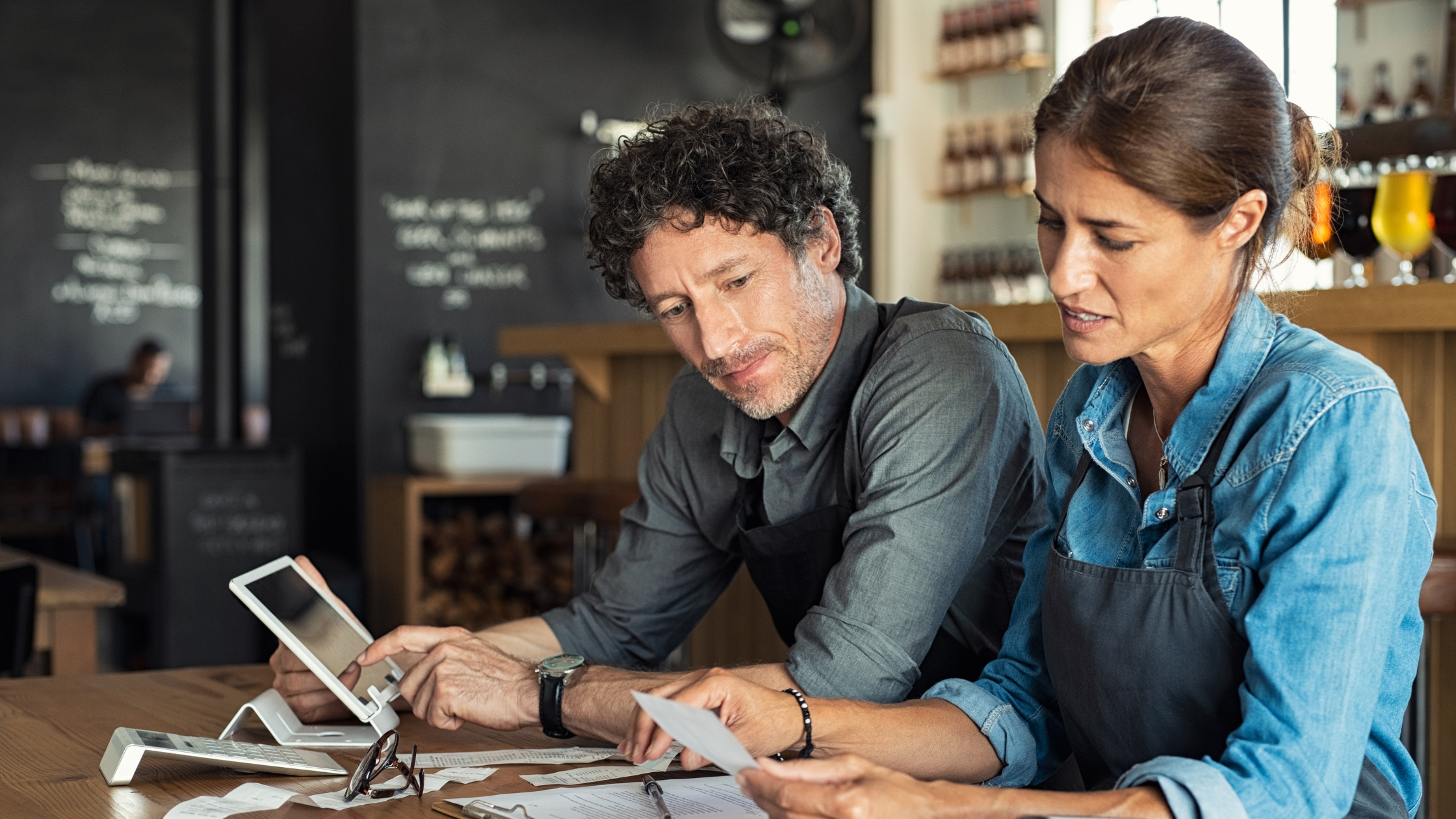 Small business owners working on accounting 