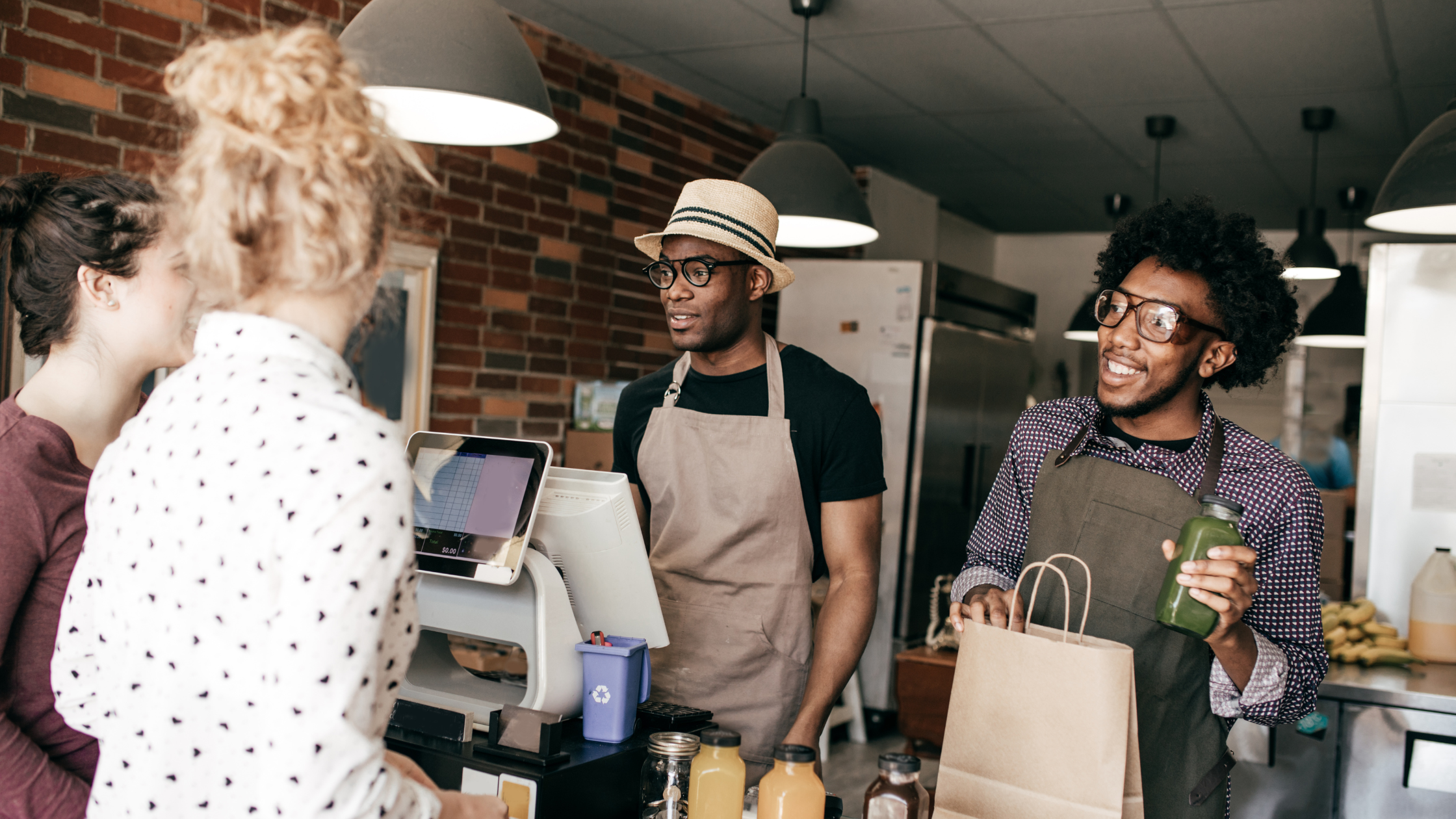 Two workers at a cafe | SBA Disaster Loans