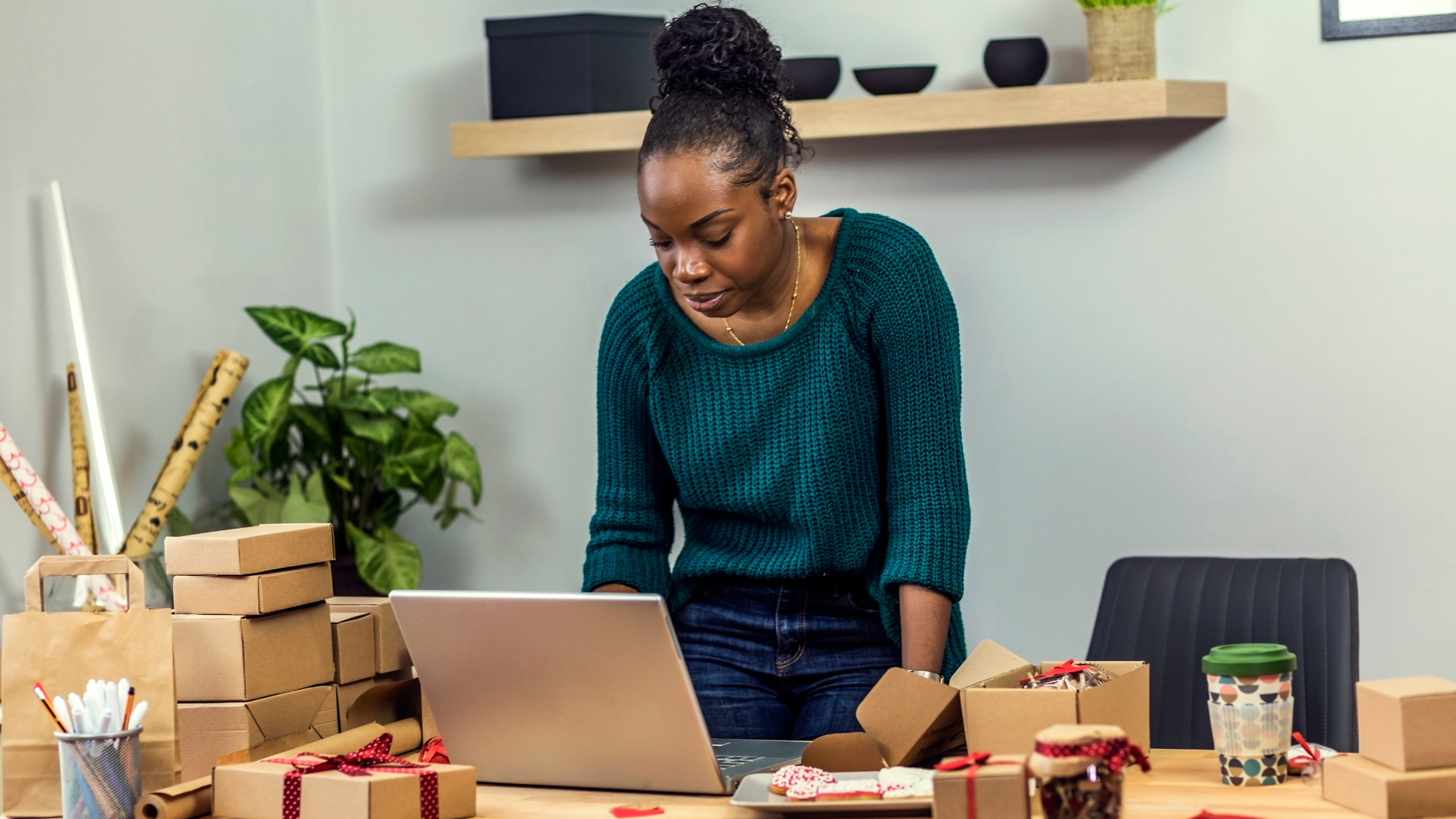 Understanding Term Loans | Woman business owner packaging orders