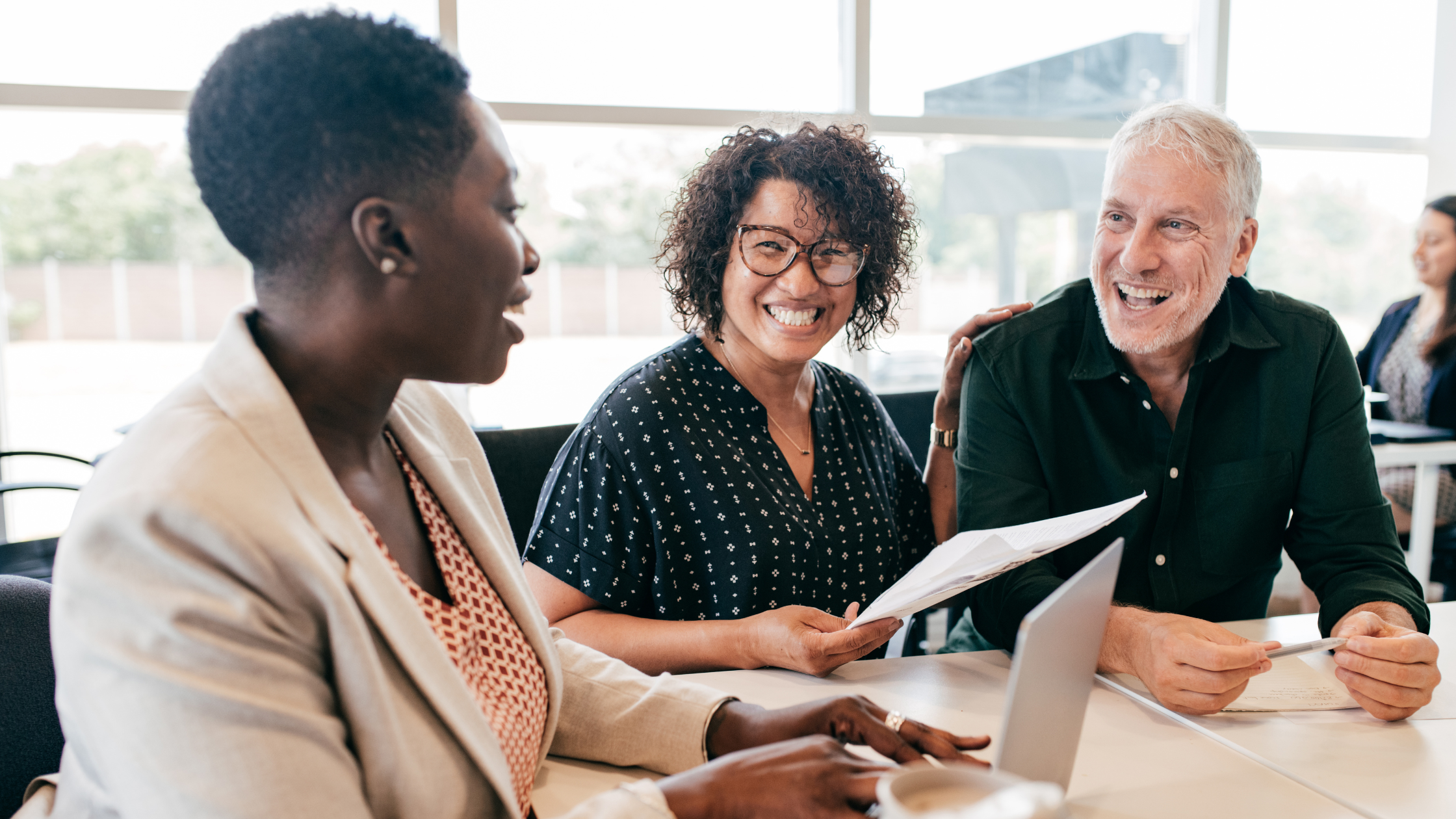 What is a Profit and Loss Statement | Three people sitting at a table