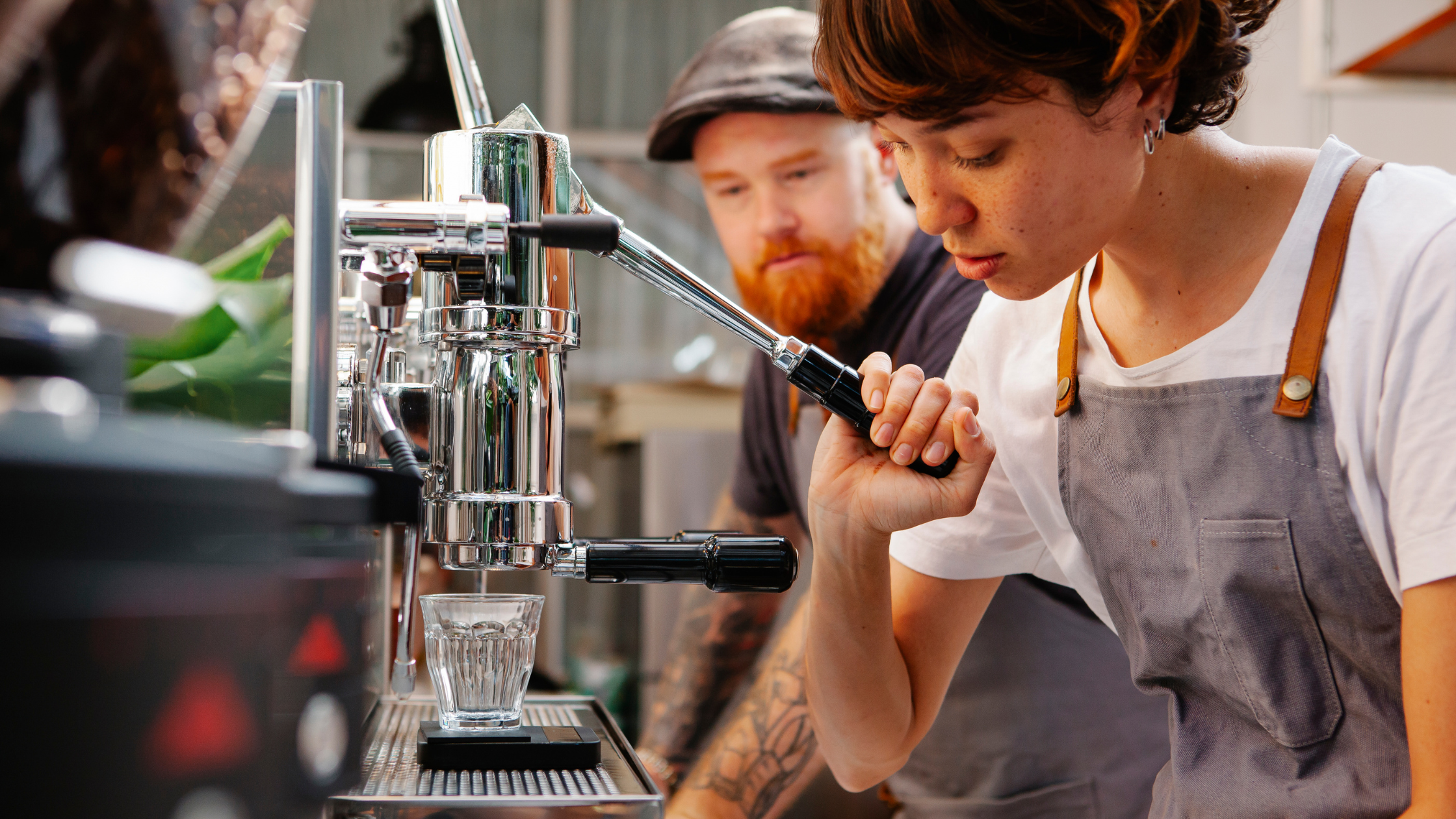 Leasing vs Buying Equipment for Your Small Business | Two coffee shop owners