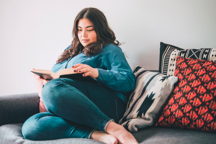 Woman reading a book.