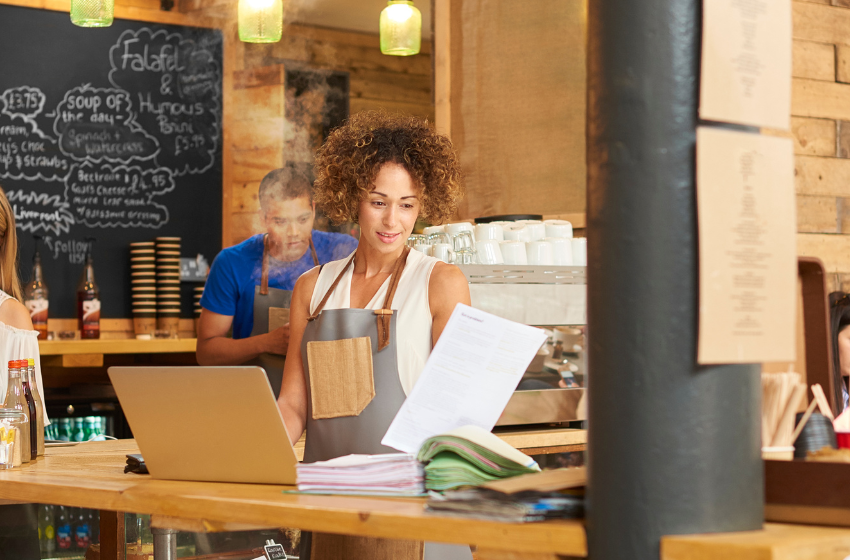 Woman Business Owner at Laptop | Do I Need a Bookkeeper for my Small Business?