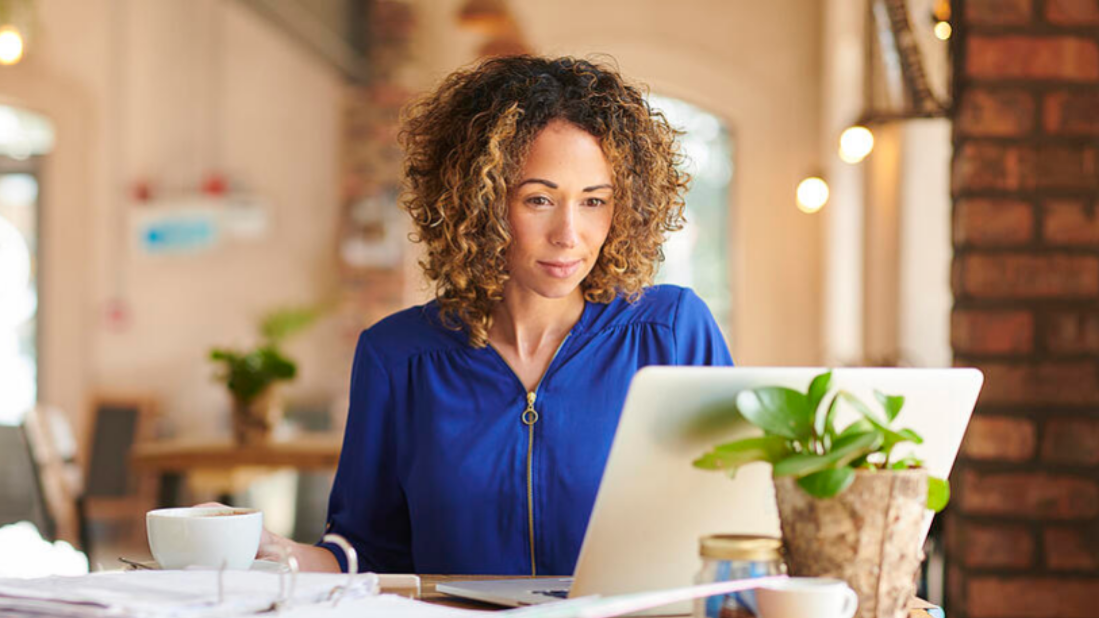 woman looking at laptop