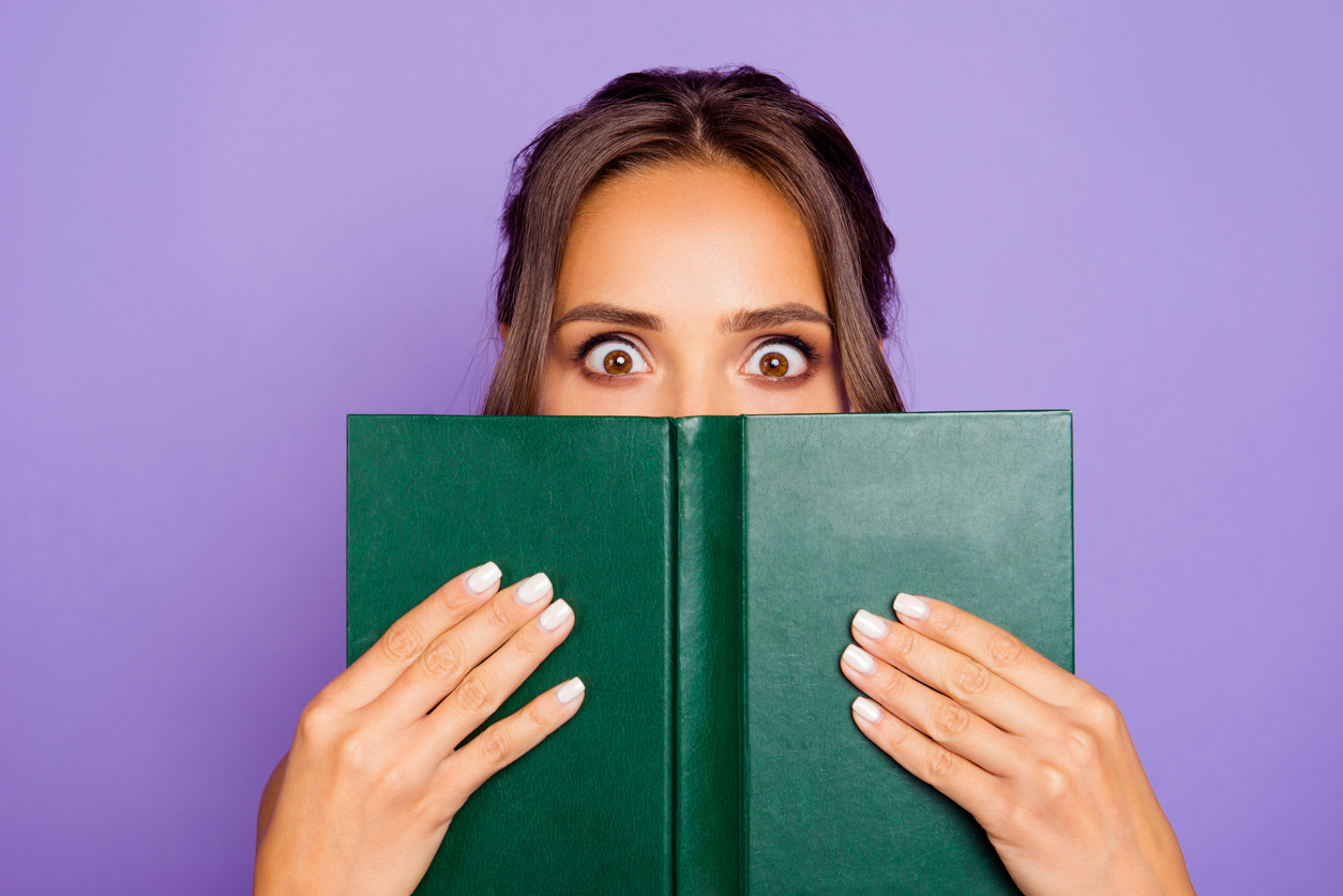 Woman gains insight by reading female business book